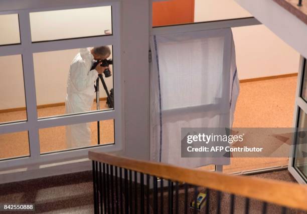 Forensic team work at the scene where a 16 year old girl was stabbed by a 19 year old boy at St. Hallvard High School in Lier, Norway, on September...