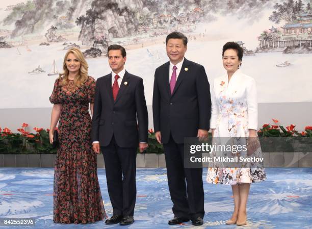 Mexican President's wife Angelica Rivera, Mexican President Enrique Pena Nieto, Chinese President Xi Jinping, his wife Peng Liyuan pose for a photo...