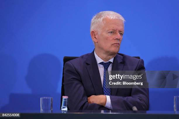 Fritz Kuhn, Stuttgart's mayor, looks on during a news conference following a diesel crisis meeting with Germany's Chancellor Angela Merkel, German...