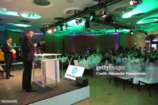 President Reinhard Grindel speaks at the Awarding Ceremony of the 20th anniversary of Volunteering for the Club 100 at Mercedes-Benz Museum on...