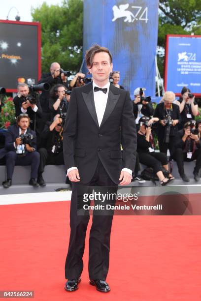 Sebastiano Riso walks the red carpet ahead of the 'Una Famiglia' screening during the 74th Venice Film Festival at Sala Grande on September 4, 2017...