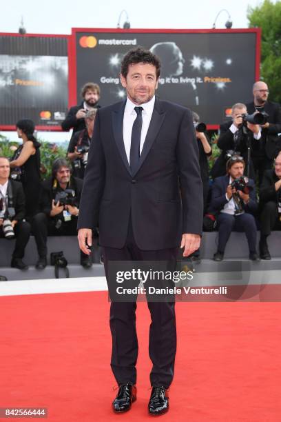 Patrick Bruel walks the red carpet ahead of the 'Una Famiglia' screening during the 74th Venice Film Festival at Sala Grande on September 4, 2017 in...