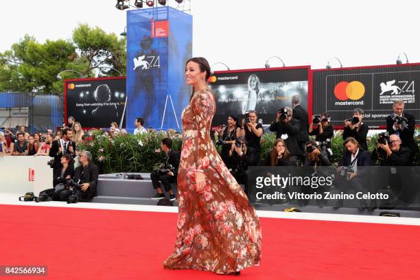 Alessia Fabiani walks the red carpet ahead of the 'Una Famiglia' screening during the 74th Venice Film Festival at Sala Grande on September 4, 2017...
