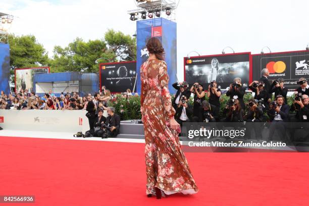 Alessia Fabiani walks the red carpet ahead of the 'Una Famiglia' screening during the 74th Venice Film Festival at Sala Grande on September 4, 2017...