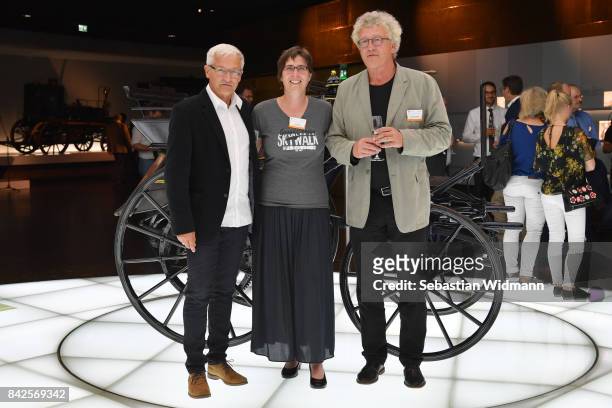 Guests pose for a picture during the Awarding Ceremony at the 20th anniversary of Volunteering for the Club 100 at Mercedes-Benz Museum on September...