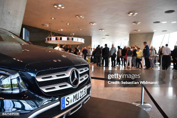 Guests arrive for the Awarding Ceremony at the 20th anniversary of Volunteering for the Club 100 at Mercedes-Benz Museum on September 4, 2017 in...