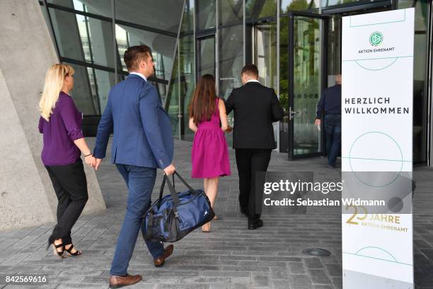 Guests arrive for the Awarding Ceremony at the 20th anniversary of Volunteering for the Club 100 at Mercedes-Benz Museum on September 4, 2017 in...