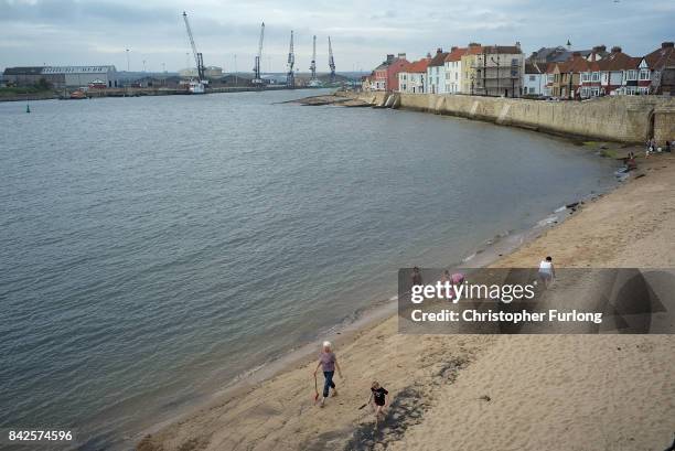 Locals spend time on the beach near the docks in the Headland area of Hartlepool,on September 4, 2017 in Hartlepool, England. Hartlepool in the North...