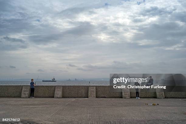 Local youths fish in the sea near the docks in the Headland area of Hartlepool,on September 4, 2017 in Hartlepool, England. Hartlepool in the North...