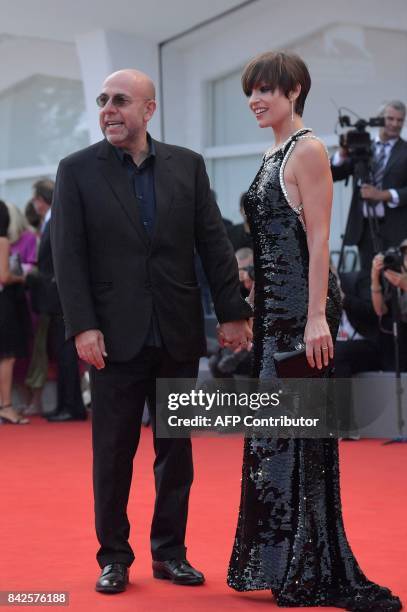 Actress Micaela Ramazzoti and director Paolo Virzi attend the premiere of the movie "Una Famiglia" presented in competition at the 74th Venice Film...