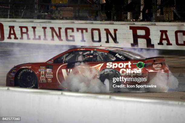 Denny Hamlin Joe Gibbs Racing Sport Clips Toyota Camry after winning the Bojangles Southern 500 on September 3 at Darlington Raceway in Darlington,...