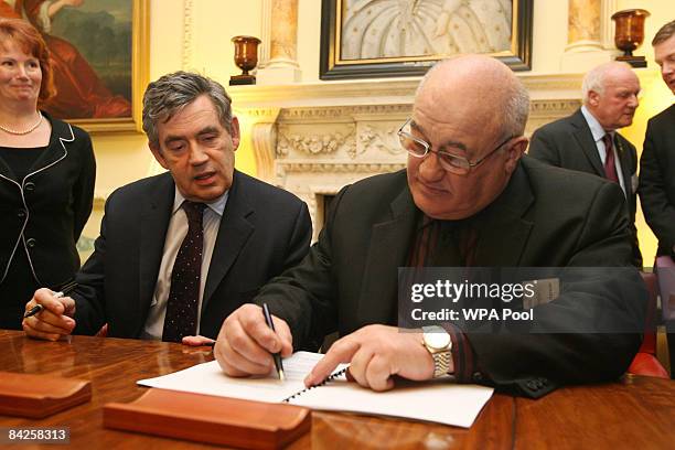 Prime Minister Gordon Brown and the leader of Blackburn and Darwen Borough Council, councillor Colin Rigby, sign a Multi-Area Agreement for the...