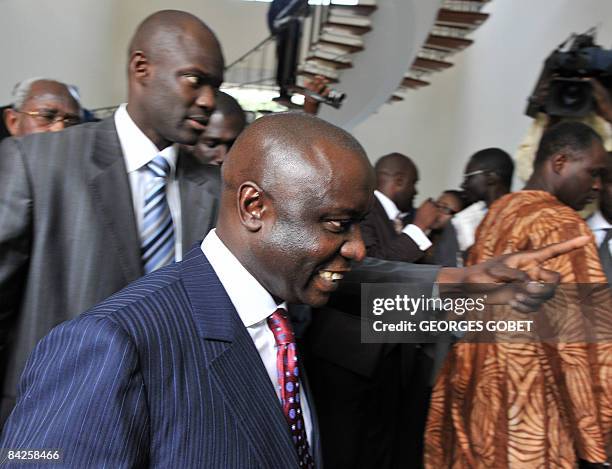 Former Senegalese Prime minister Idrissa Seck answers questions after his meeting with Senegalese President Abdoulaye Wade in Dakar on January 12,...