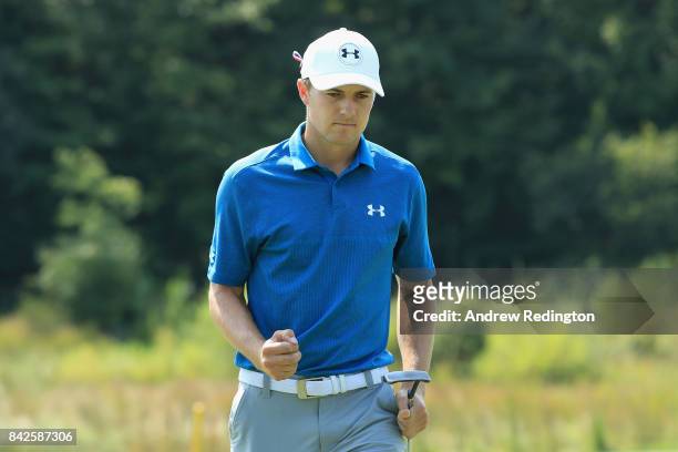 Jordan Spieth of the United States reacts after making his eagle putt on the second green during the final round of the Dell Technologies...