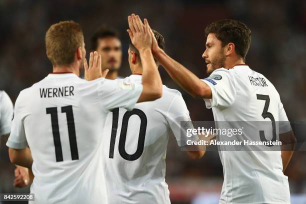 Mesut Oezil of Germany is celebrated by Jonas Hector of Germany and Timo Werner of Germany after he scored Germany's first goal. During the FIFA 2018...
