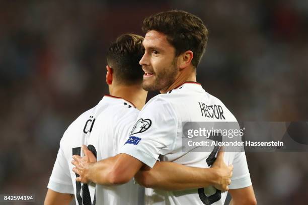 Mesut Oezil of Germany is celebrated by Jonas Hector of Germany after he scored Germany's first goal to make it 1:0 during the FIFA 2018 World Cup...