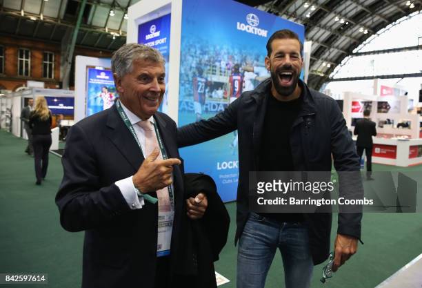 Ruud van Nistelrooy of the Netherlands laughs with David Dein, The FA former Vice-Chairman during day 1 of the Soccerex Global Convention at...