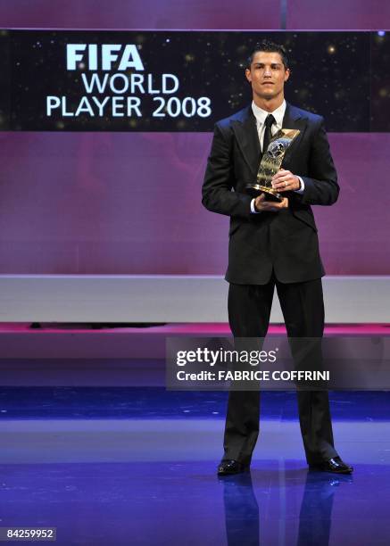 Portuguese football player Cristiano Ronaldo stands after receiving FIFA world Footballer of the Year 2008 award on January 12, 2009 in Zurich....