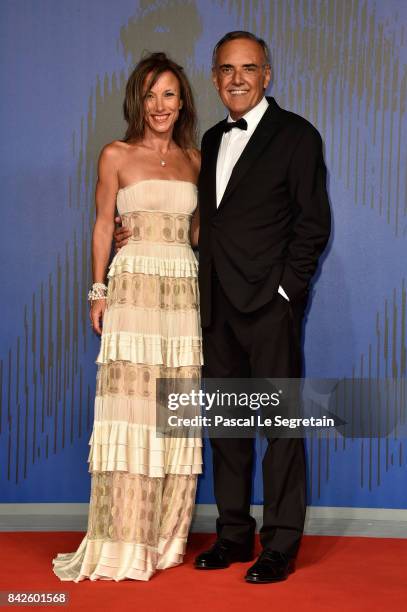 Silvia Grilli and Alberto Barbera walk the red carpet ahead of the 'Woodshock' screening during the 74th Venice Film Festival at Sala Giardino on...