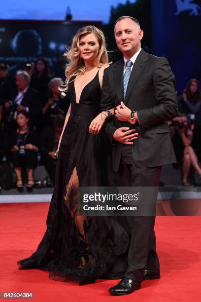 Maria Ivakova wearing a Jaeger-LeCoultre watch and a guest walk the red carpet ahead of the 'Three Billboards Outside Ebbing, Missouri' screening...
