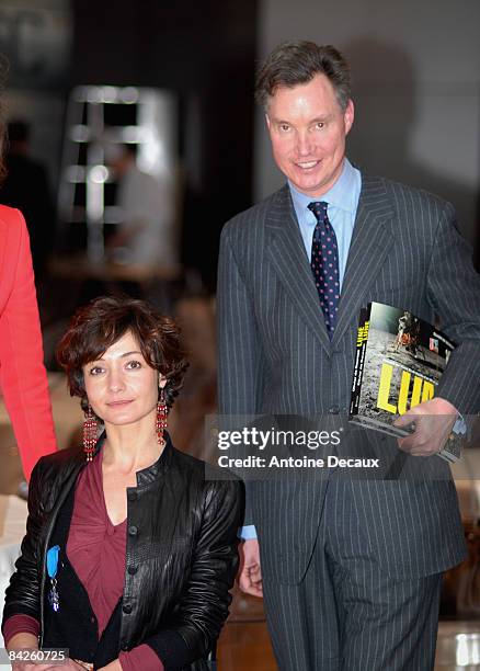 Pilot Dorine Bourneton poses with Guillaume, Prince of Luxemburg after being presented with the Medaille de l'Ordre National du Merite by the...
