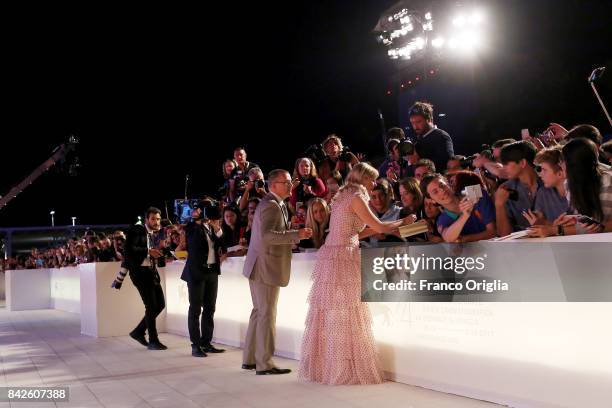 Kirsten Dunst from 'Woodshock' movie signs autographs during the red carpet ahead of the 'Three Billboards Outside Ebbing, Missouri' screening during...