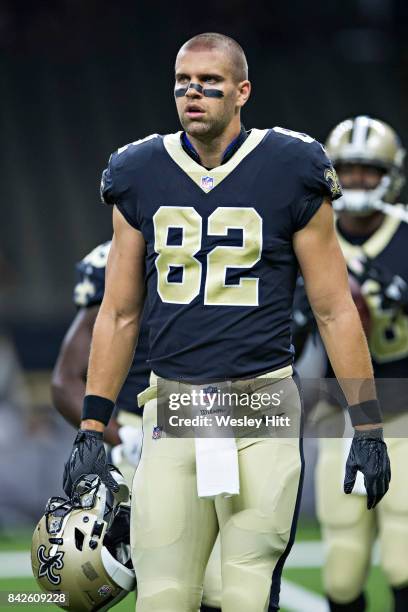 Coby Fleener of the New Orleans Saints warming up before a preseason game against the Baltimore Ravens at Mercedes-Benz Superdome on August 31, 2017...