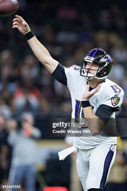 Ryan Mallett of the Baltimore Ravens throws a pass during a preseason game against the New Orleans Saints at Mercedes-Benz Superdome on August 31,...