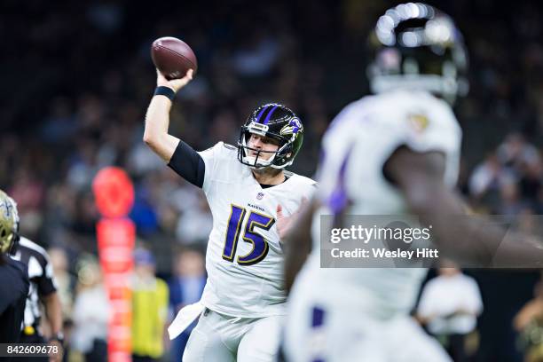 Ryan Mallett of the Baltimore Ravens throws a pass during a preseason game against the New Orleans Saints at Mercedes-Benz Superdome on August 31,...