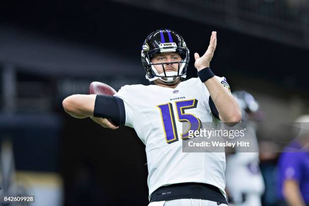 Ryan Mallett of the Baltimore Ravens warming up before a preseason game against the New Orleans Saints at Mercedes-Benz Superdome on August 31, 2017...