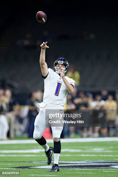 Josh Woodrum of the Baltimore Ravens warming up before a preseason game against the New Orleans Saints at Mercedes-Benz Superdome on August 31, 2017...