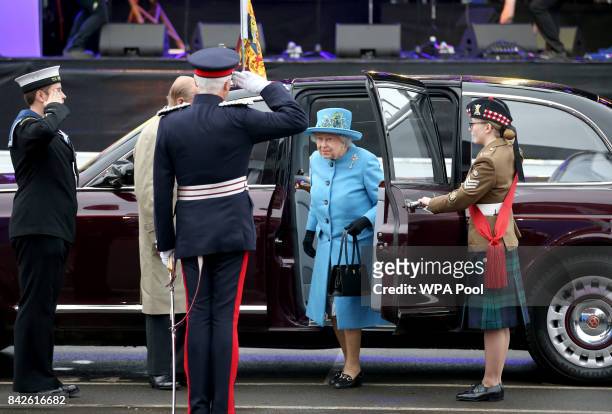 Queen Elizabeth II arrives along the Queensferry Crossing during the official opening of the new bridge across the Firth of Forth on September 4,...