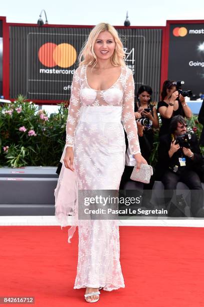 Vera Atyushkina walks the red carpet ahead of the 'Una Famiglia' screening during the 74th Venice Film Festival at Sala Grande on September 4, 2017...