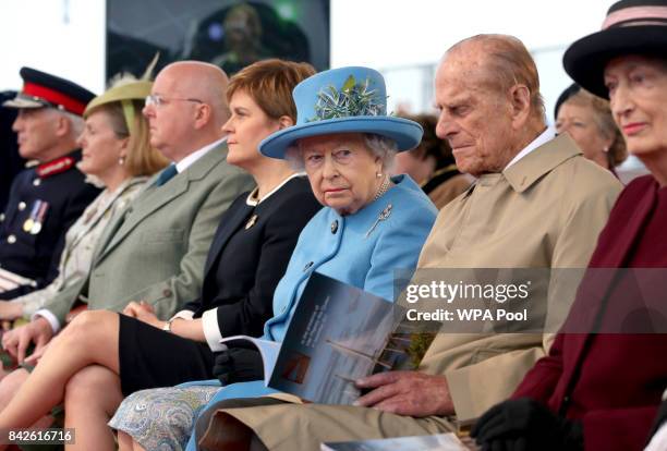 Queen Elizabeth II, Prince Philip, Duke of Edinburgh and First Minister Nicola Sturgeon on the Queensferry Crossing during the official opening of...