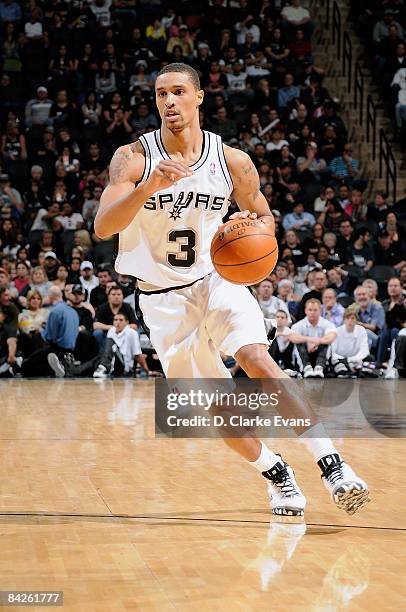 George Hill of the San Antonio Spurs drives the ball to the basket during the game against the Oklahoma City Thunder on December 14, 2008 at the AT&T...
