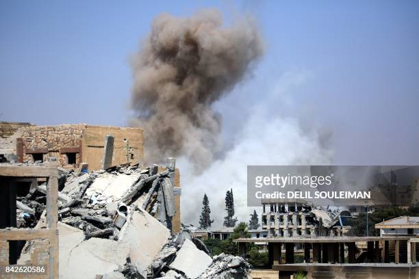 Smoke billows in Raqa on September 4 as Syrian Democratic Forces , a US backed Kurdish-Arab alliance, battle to retake the northern Syrian city from...