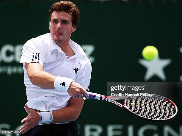 Ernests Gulbis of Latvia plays a forehand during his first round match against Marcel Granollers of Spain during day two of the Heineken Open at ASB...