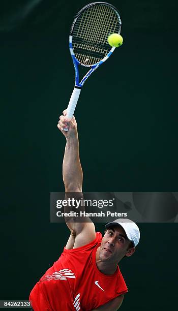 Bobby Reynolds of the USA serves during his first round match against Oscar Hernandez of Spain during day two of the Heineken Open at ASB Tennis...