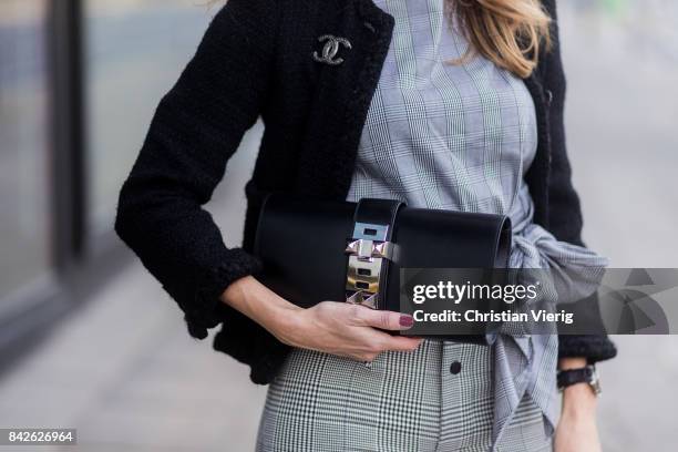 Alexandra Lapp wearing grey checked top and checked high waist pants by Zara, flat cap hat from Chanel, Tweed little black jacket in black from...