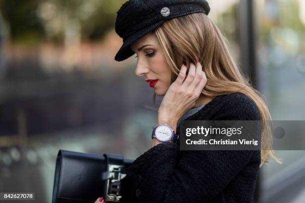 Alexandra Lapp wearing grey checked top and checked high waist pants by Zara, flat cap hat from Chanel, Tweed little black jacket in black from...