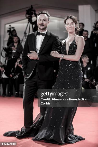 Nicolas Sirie and Cristiana Capotondi walk the red carpet ahead of the 'Three Billboards Outside Ebbing, Missouri' screening during the 74th Venice...