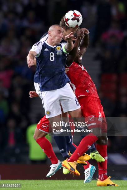 Scott Brown of Scotland and Alex Muscat of Malta battle for the ball in the air during the FIFA 2018 World Cup Qualifier between Scotland and Malta...