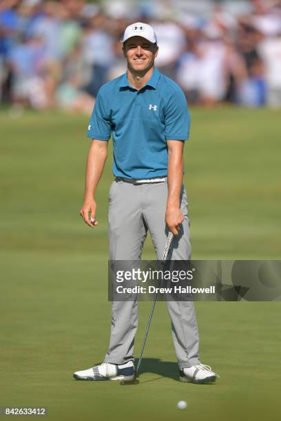 Jordan Spieth of the United States reacts after missing a putt for birdie on the ninth green during the final round of the Dell Technologies...