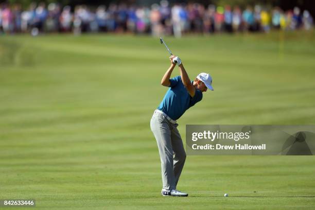 Jordan Spieth of the United States plays a shot on the tenth hole during the final round of the Dell Technologies Championship at TPC Boston on...