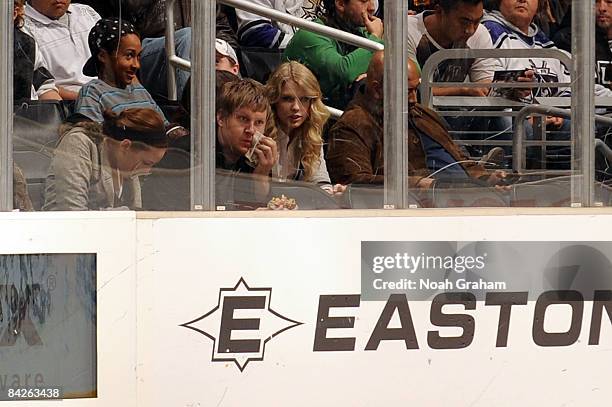 Recording Artist Taylor Swift attends the NHL game between the Tampa Bay Lightning and the Los Angeles Kings during the game on January 12, 2009 at...