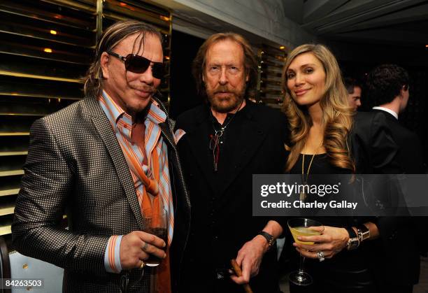 Actor Mickey Rourke with guests attends Los Angeles Confidential Magazine's evening with Mickey Rourke at the London West Hollywood hotel on January...