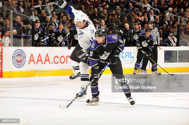 Ryan Malone of the Tampa Bay Lightning collides with Peter Harrold of the Los Angeles Kings during the game on January 12, 2009 at Staples Center in...