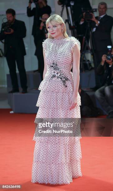 Kirsten Dunst walk the red carpet ahead of the 'Woodshock' screening during the 74th Venice Film Festival in Venice, Italy, on September 4, 2017.