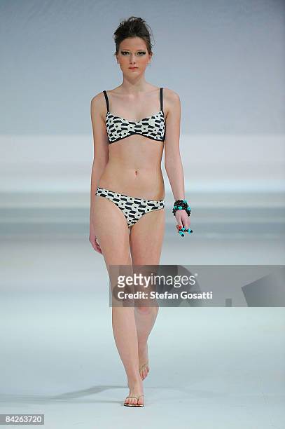 Model showcases designs by Oceano Pacifico as part of the Taipei In Style Fashion show on the catwalk as part of Hong Kong Fashion Week Fall/Winter...