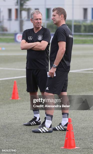 Germany U18 coach Guido Streichsbier and Germany U16 coach Michael Feichtenbeiner perform a show training for DFB junior coaches on September 4, 2017...